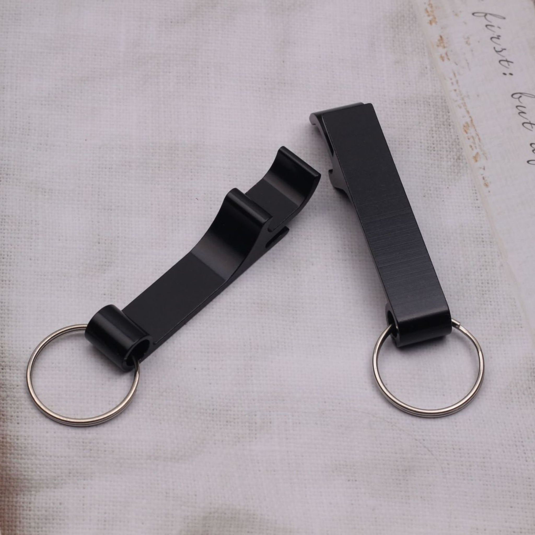 Black Bottle Opener – Utility Meets Urgency